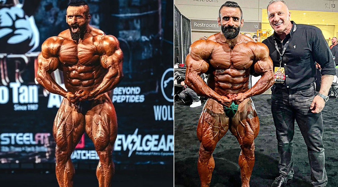 Hadi Choopan posando com físico extremamente definido em um palco de fisiculturismo sob luzes intensas