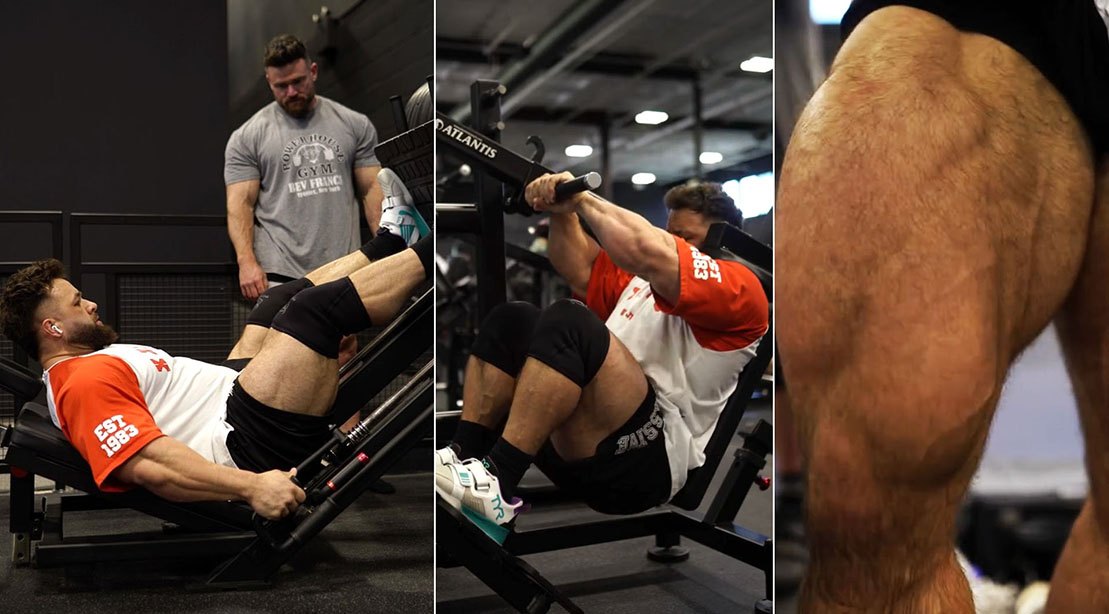 Um homem musculoso sentado em uma máquina de leg press, com pesos ao lado e um copo de proteína em cima de uma mesa de treino